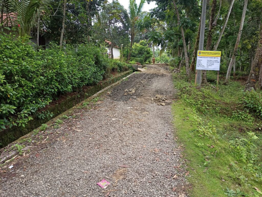 Pembangunan Rabat Beton Jalan Kamboja Desa Sawangan
